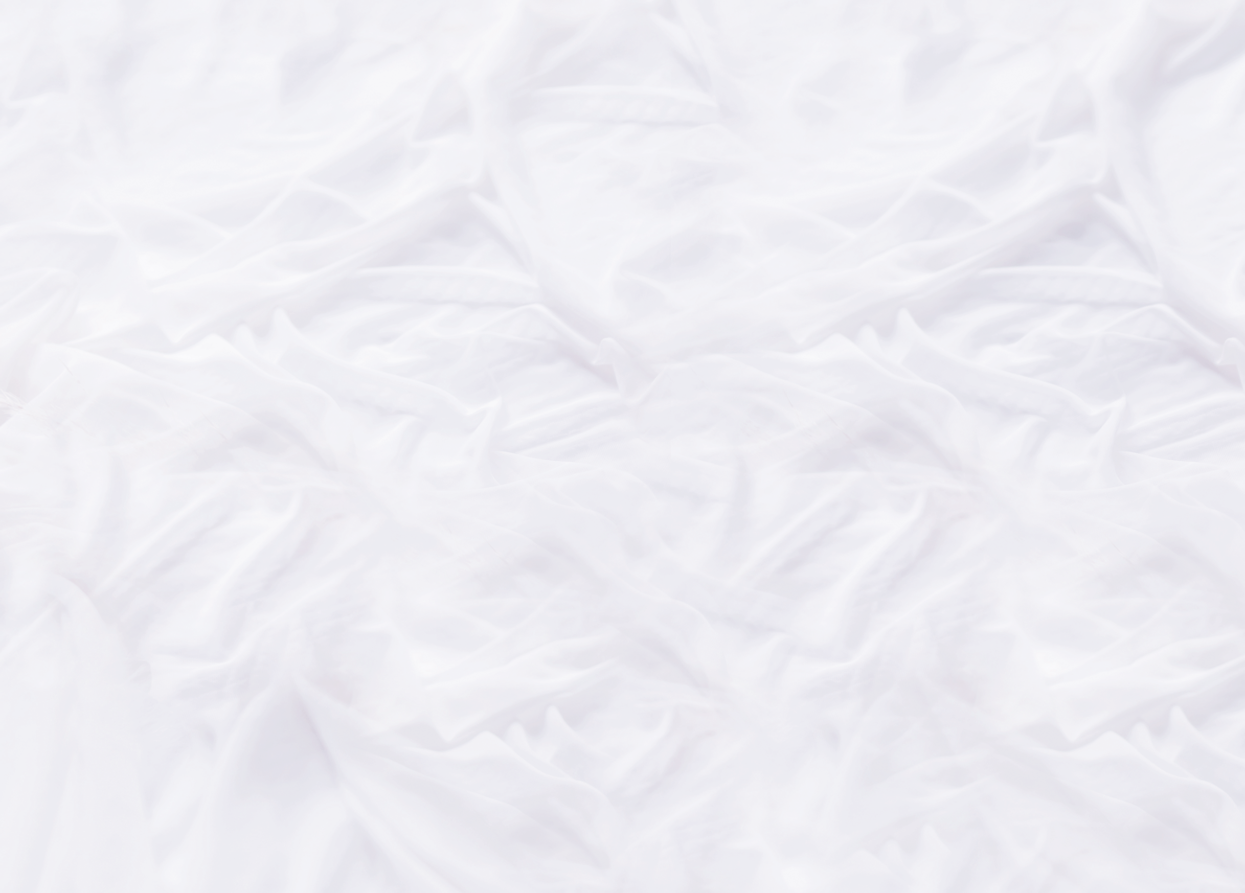 White silk fabric. Graceful background with pastel colored folded textile. Cozy stilllife backdrop.